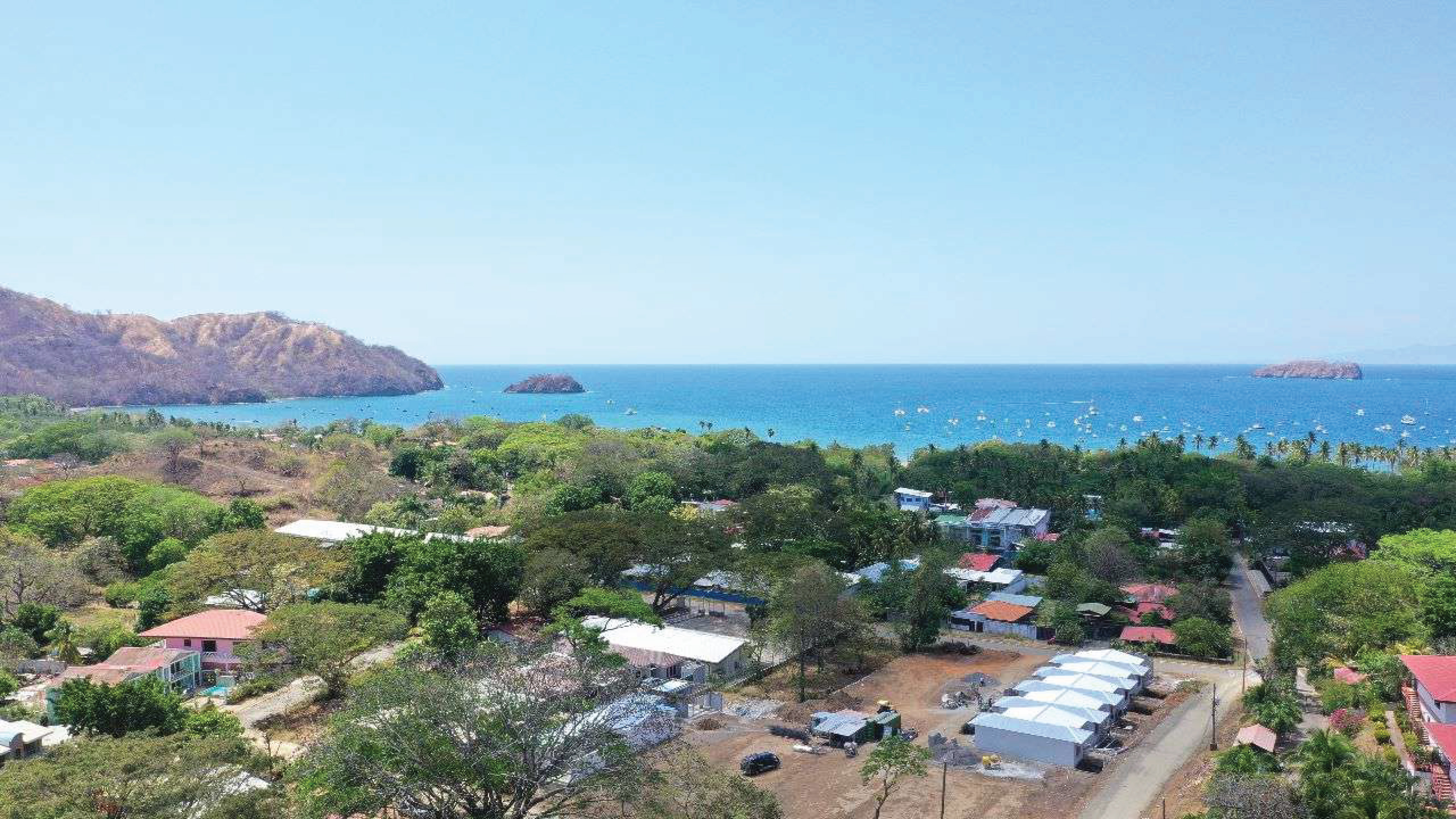 Aerial view of Carrillo town with ocean and islands in the background